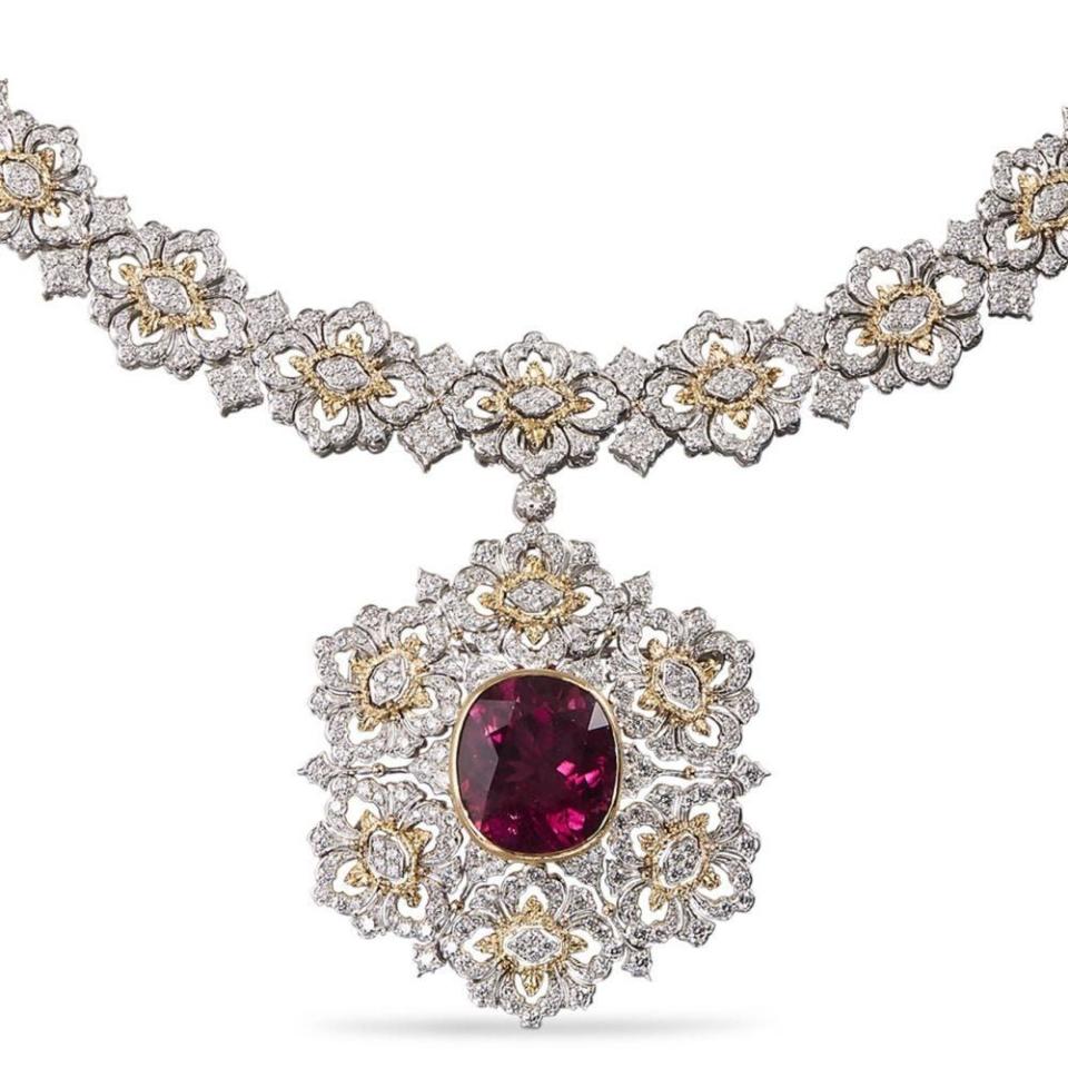 <p><strong>Buccellati</strong></p><p>Buccellati</p><p><a href="https://www.buccellati.com/en_us/opera-high-jewellery-pendant-jaupen014889xxx000.html" rel="nofollow noopener" target="_blank" data-ylk="slk:Shop Now;elm:context_link;itc:0;sec:content-canvas" class="link ">Shop Now</a></p><p>An intricate white and gold setting displays the maison's advanced artistry when it comes to metalwork. A burgundy tourmaline mimics the deep rubies of the queen's necklace. </p>