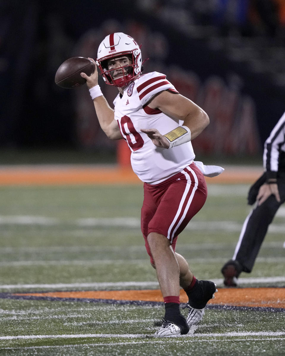 Nebraska quarterback Heinrich Haarberg begins to pass during the first half of the team's NCAA college football game against Illinois, Friday, Oct. 6, 2023, in Champaign, Ill. (AP Photo/Charles Rex Arbogast)