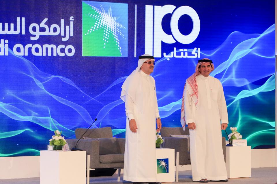 President and CEO of Saudi Aramco Amin Nasser (L) and Aramco's chairman Yasir al-Rumayyan attend a press conference in the eastern Saudi Arabian region of Dhahran on November 3, 2019. - Saudi Aramco confirmed it planned to list on the Riyadh stock exchange, describing it as a "significant milestone" in the history of the energy giant. (Photo by - / AFP) (Photo by -/AFP via Getty Images)