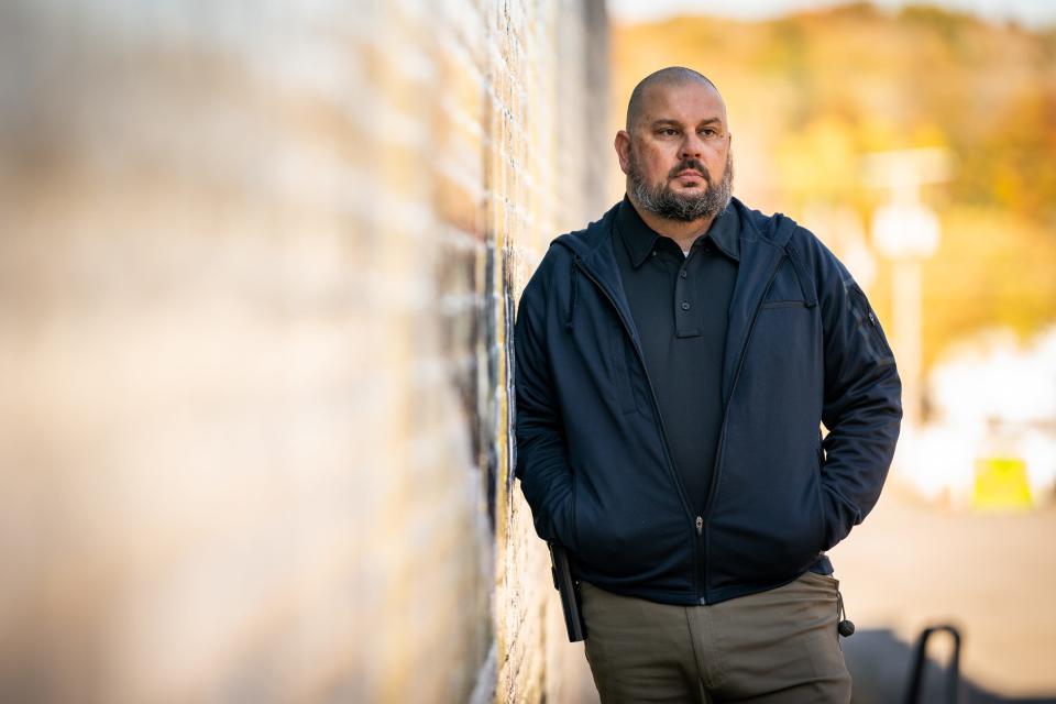 Joe Duncan poses for a portrait on Nov. 4 in downtown Waverly, Tennessee where recovery continues from a flood disaster in August 2021 that claimed the lives of 20 people. More than 17 inches of rain fell, breaking the state's all-time record high. Duncan and his wife lost their home east of Waverly.