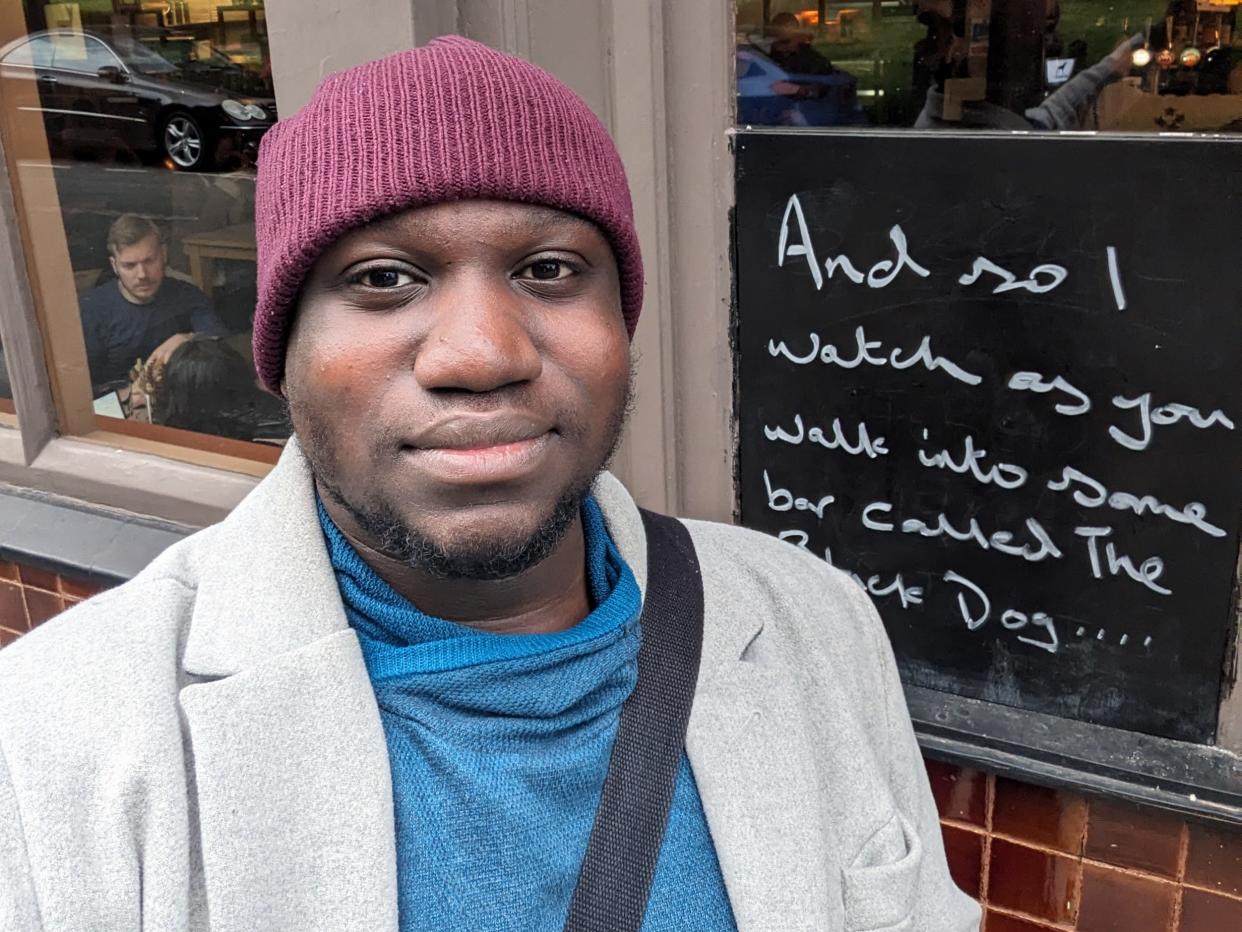 Photo of reporter outside The Black Dog pub.