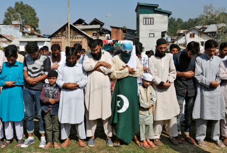Kashmiri Muslims offer funeral prayers in absentia in Srinagar September 30, 2016 for two Pakistani soldiers who were killed in cross-border fire with Indian soldiers early on Thursday in the disputed region of Kashmir. REUTERS/Danish Ismail