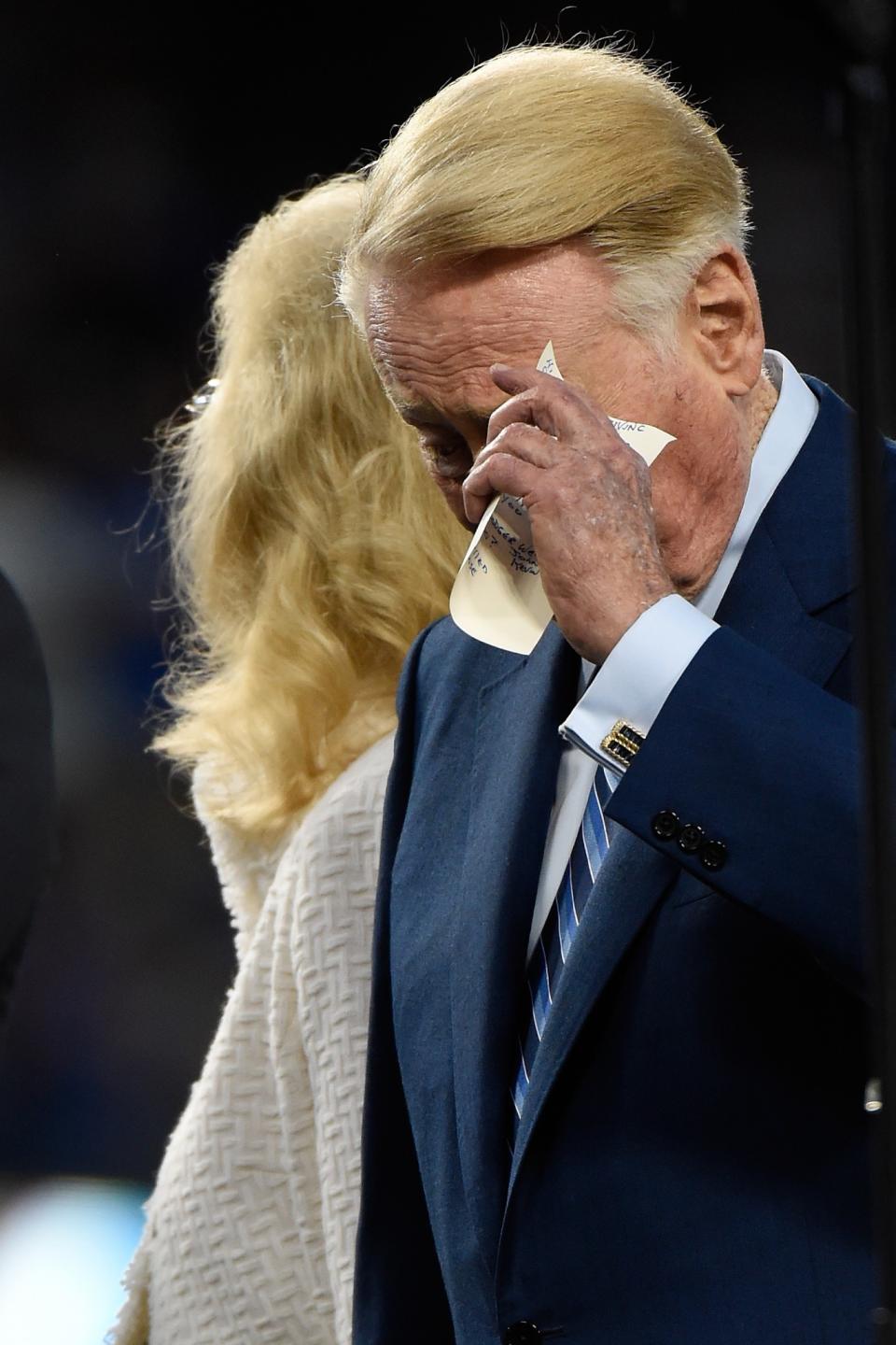 <p>Vin Scully takes a moment during a retirement ceremony in his honor before the game at Dodger Stadium on September 23, 2016 in Los Angeles, California. (Photo by Lisa Blumenfeld/Getty Images) </p>