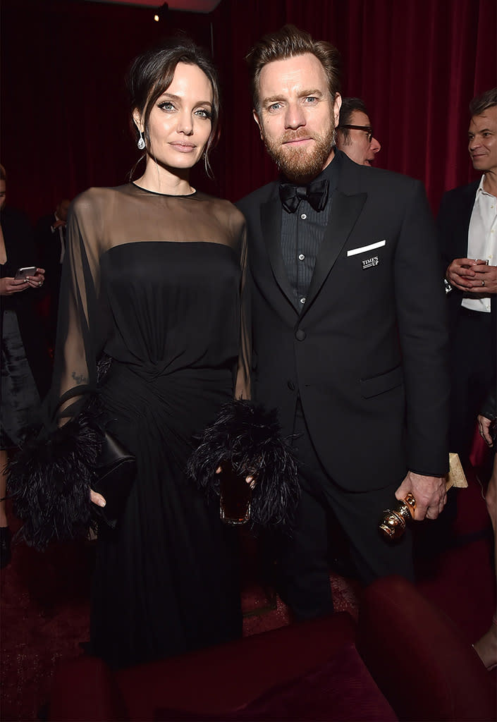 <p>Angelina Jolie and Ewan McGregor caught up at the Netflix after-party at the Waldorf Astoria Beverly Hills. While the <em>Fargo</em> winner didn’t thank his old pal in his Golden Globes acceptance speech, he made sure to shout out to both his <a rel="nofollow" href="https://www.yahoo.com/entertainment/ewan-mcgregor-thanks-estranged-wife-032038575.html" data-ylk="slk:estranged wife and rumored girlfriend;elm:context_link;itc:0;sec:content-canvas;outcm:mb_qualified_link;_E:mb_qualified_link;ct:story;" class="link  yahoo-link">estranged wife and rumored girlfriend</a>. (Photo: Kevin Mazur/Getty Images for Netflix) </p>