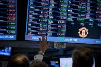 Traders work on the floor of the New York Stock Exchange (NYSE) February 10, 2014. REUTERS/Brendan McDermid