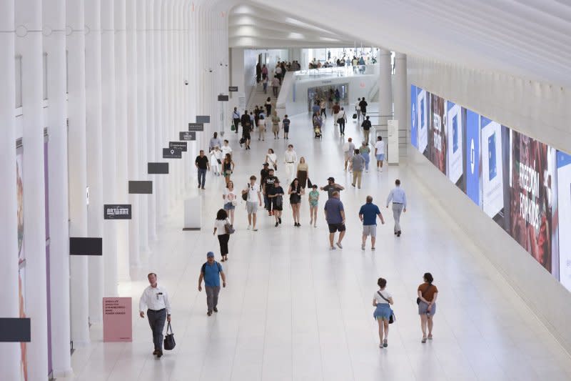 Travelers and shoppers walk The Oculus and World Trade Center Transportation Hub in New York City, July 2023. “This will be the most crowded Memorial Day weekend at airports since 2005,” AAA is advising 2024 travelers. File photo by John Angelillo/UPI