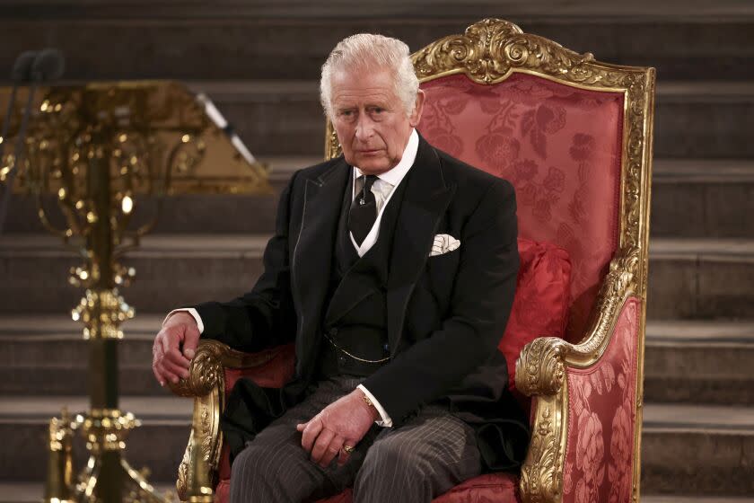 Britain's King Charles III sits at Westminster Hall, where both Houses of Parliament are meeting to express their condolences following the death of Queen Elizabeth II, at Westminster Hall, in London, Monday, Sept. 12, 2022. Queen Elizabeth II, Britain's longest-reigning monarch, died Thursday after 70 years on the throne. (Henry Nicholls/Pool Photo via AP)