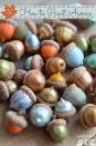 <p>Grab the kids and paint stray acorns fun colors, and then stick them in a clear bowl to see all of the beautiful colors in one spot. Don't be afraid to add some glitter!</p>