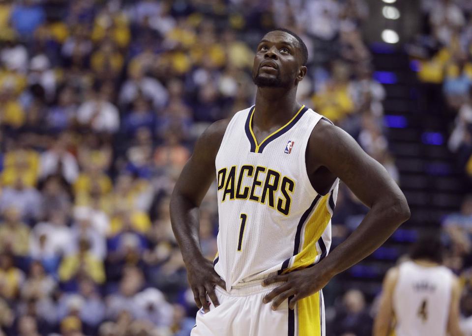 Indiana Pacers' Lance Stephenson (1) looks up at the scoreboard during the first half in Game 5 of an opening-round NBA basketball playoff series against the Atlanta Hawks Monday, April 28, 2014, in Indianapolis. (AP Photo/Darron Cummings)