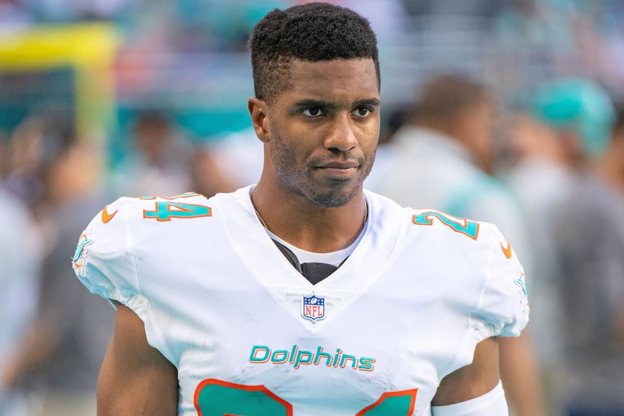 Miami Dolphins cornerback Byron Jones (24) walks on the sidelines during an NFL football game against the New York Giants, in Miami Gardens, Fla Giants Dolphins Football, Miami Gardens, United States - 05 Dec 2021