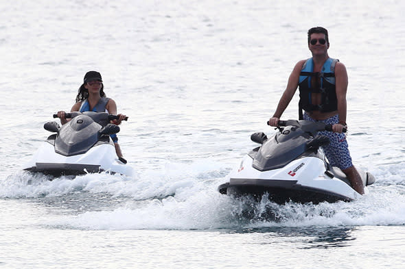 Mandatory Credit: Photo by Olycom SPA/REX (4313906e) Simon Cowell and Lauren Silverman Simon Cowell and Lauren Silvermann visit Barbados - 18 Dec 2014  