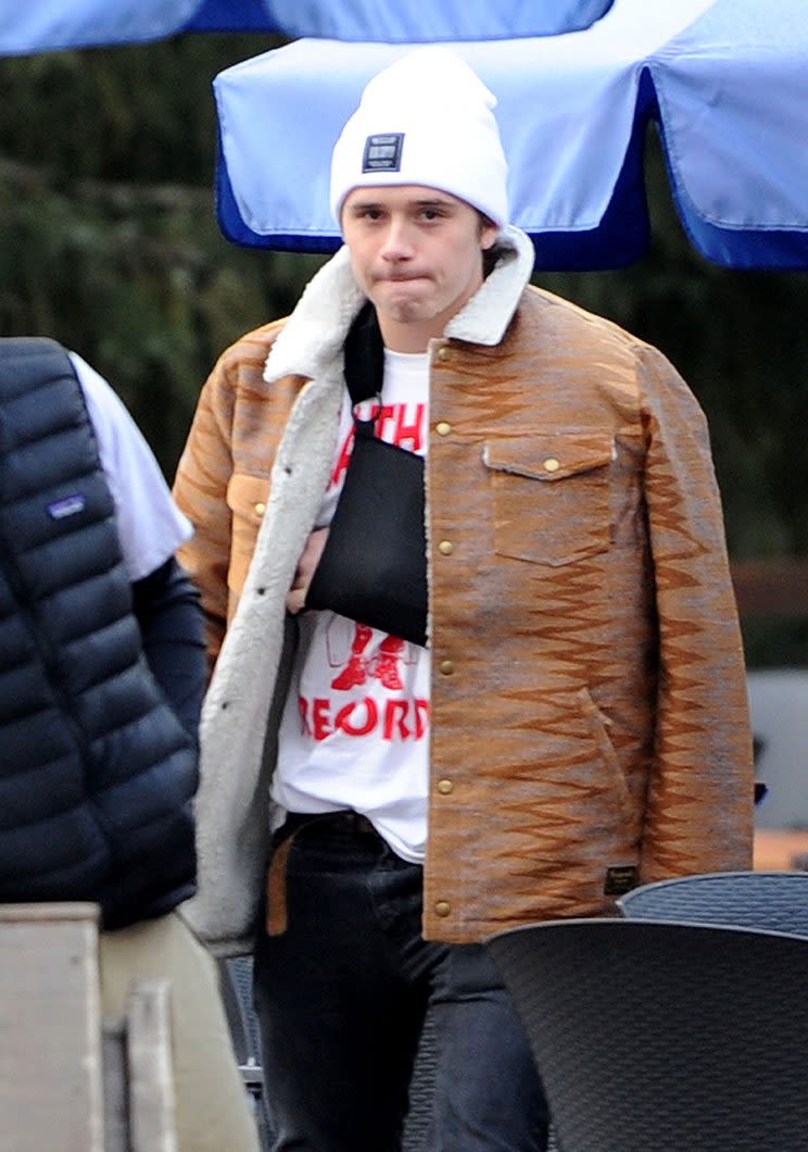 Brooklyn Beckham sporting a sling after his accident. (Photo: MEGA)