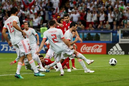 Soccer Football - World Cup - Group B - Iran vs Spain - Kazan Arena, Kazan, Russia - June 20, 2018 Iran's Saeid Ezatolahi scores but the goal is subsequently disallowed for offside following a referral to VAR REUTERS/Jorge Silva