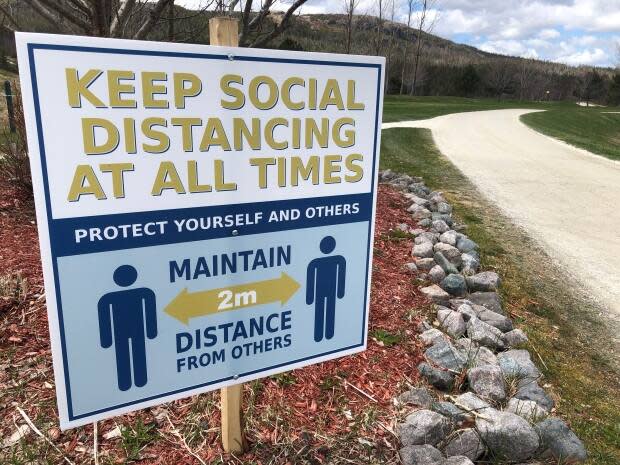 Signs like this one are posted all over The Willows Golf Course in Holyrood. After a successful 2020 season, golf operations manager Pat Guitar says the 2021 season is off to a fast start. (Jeremy Eaton/CBC - image credit)