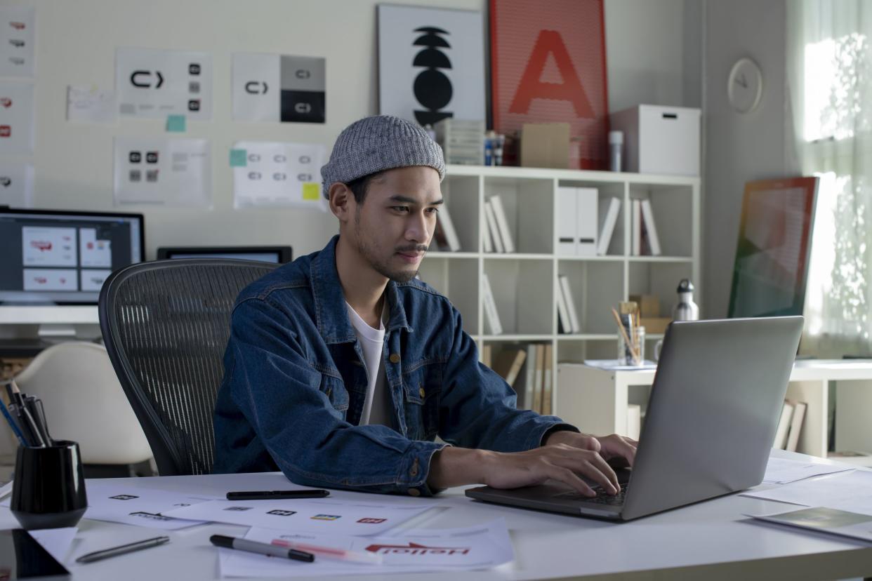 Asian man Graphic designer working in office. Artist Creative Designer Illustrator Graphic Skill Concept.