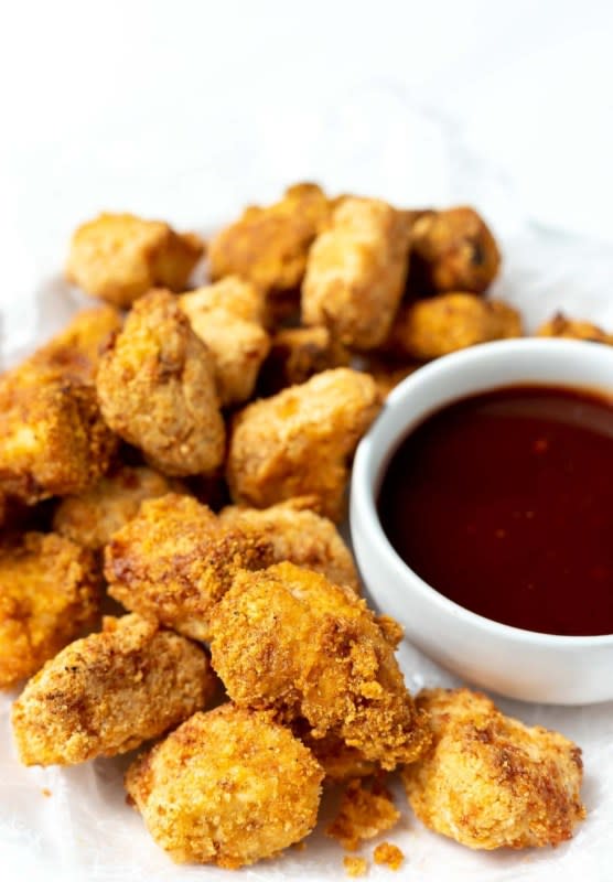 <p>These air fryer chicken nuggets are better than any fast food. You’ll never want to hit the drive-thru again once you make this copycat recipe.</p><p><strong>Get the recipe: <a href="https://wonkywonderful.com/air-fryer-chicken-nuggets-recipe/" rel="nofollow noopener" target="_blank" data-ylk="slk:Air Fryer Chicken Nuggets;elm:context_link;itc:0;sec:content-canvas" class="link rapid-noclick-resp">Air Fryer Chicken Nuggets</a></strong></p>