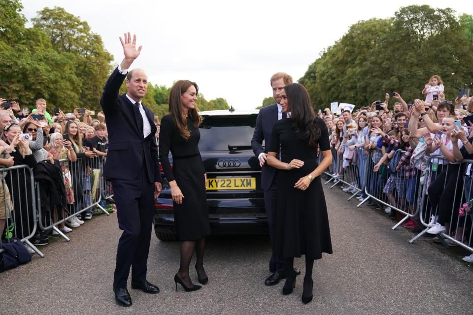 windsor, england september 10 catherine, princess of wales, prince william, prince of wales, prince harry, duke of sussex, and meghan, duchess of sussex meet members of the public on the long walk at windsor castle on september 10, 2022 in windsor, england crowds have gathered and tributes left at the gates of windsor castle to queen elizabeth ii, who died at balmoral castle on 8 september, 2022 photo by kirsty oconnor wpa poolgetty images