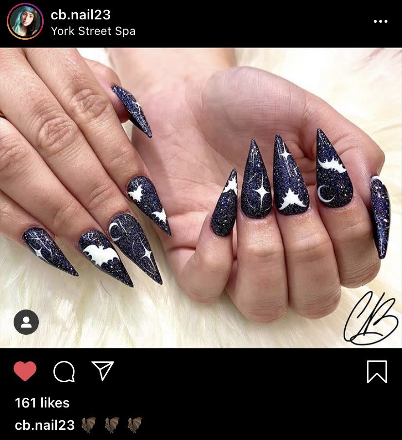 <p>Are you into darker, moodier colors? Do as <a href="https://www.instagram.com/cb.nail23/" rel="nofollow noopener" target="_blank" data-ylk="slk:nail artist Chloee;elm:context_link;itc:0;sec:content-canvas" class="link ">nail artist Chloee</a> did and let the moons, stars, (and bats!) of the nighttime sky inspire your Halloween mani this year. </p><p><a class="link " href="https://www.amazon.com/%C2%BFIlnp-t%C3%BA-hologr%C3%A1fico-profundo-0-4/dp/B082H6SJQ3?tag=syn-yahoo-20&ascsubtag=%5Bartid%7C10072.g.33239588%5Bsrc%7Cyahoo-us" rel="nofollow noopener" target="_blank" data-ylk="slk:SHOP NAVY POLISH;elm:context_link;itc:0;sec:content-canvas">SHOP NAVY POLISH</a></p>