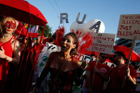 A drag queen takes part in a Gay Pride parade in Athens, Greece June 9, 2018. REUTERS/Costas Baltas