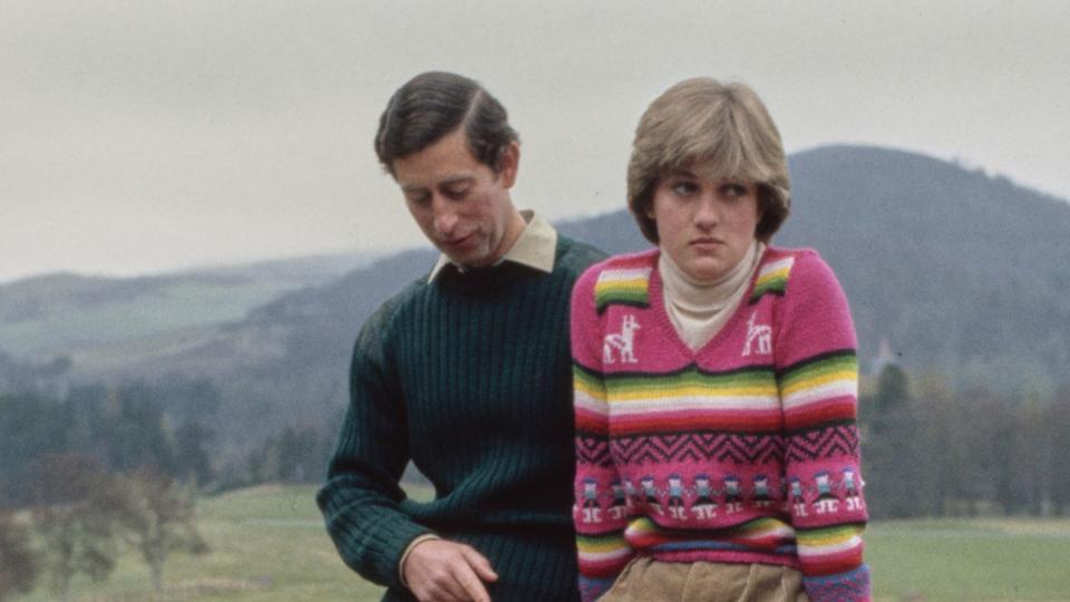 Prince Charles and Lady Diana Spencer hold a photocall with their dog Harvey at Craigowan Lodge in Balmoral, Scotland, 6th May 1981. This was their first official photocall after their engagement. Diana is wearing an Inca jumper with green corduroy trousers and Hunter boots