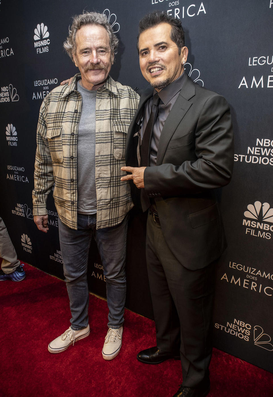 (L-R) Bryan Cranston and John Leguizamo attend the Los Angeles Special Screening Of "Leguizamo Does America" at Universal Studios AMC at CityWalk Hollywood on April 11, 2023 in Universal City, California.