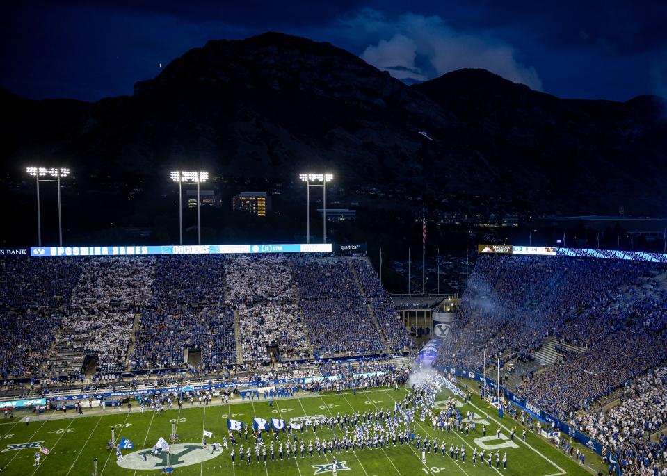 BYU Cougars players enter the field before the game against the Sam Houston Bearkats at LaVell Edwards Stadium in Provo on Saturday, Sept. 2, 2023. | Spenser Heaps, Deseret News