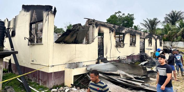 The burnt, roofless dormitory of Mahdia Secondary School in Guyana after a massive blaze on May 21, 2023.