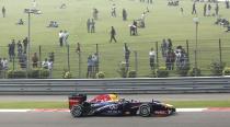 Red Bull Formula One driver Sebastian Vettel of Germany drives during the qualifying session of the Indian F1 Grand Prix at the Buddh International Circuit in Greater Noida, on the outskirts of New Delhi, October 26, 2013. REUTERS/Adnan Abidi (INDIA - Tags: SPORT MOTORSPORT F1)