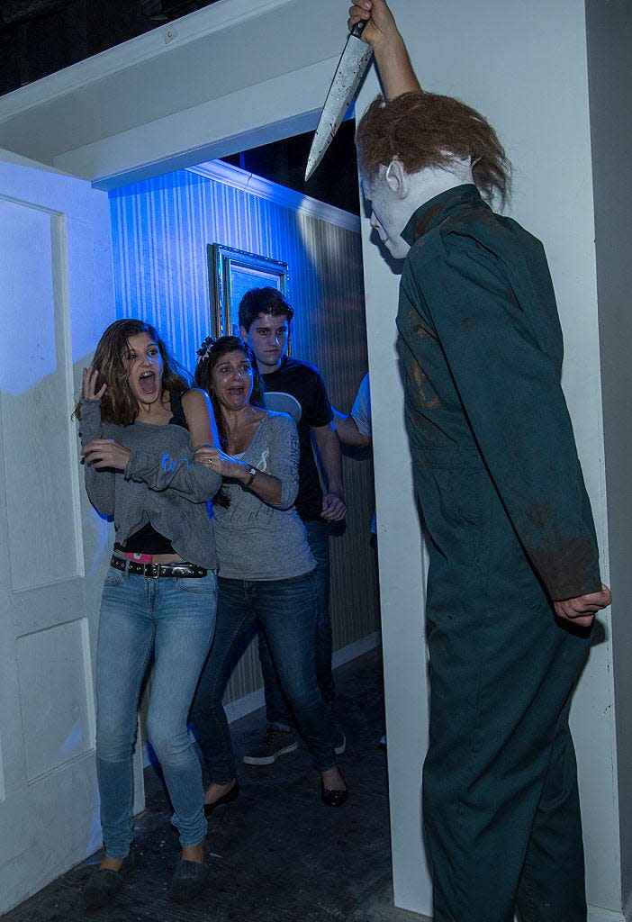 Michael Myers greeted guests in the "Halloween" haunted house at 2014's Halloween Horror Nights at Universal Orlando Resort.