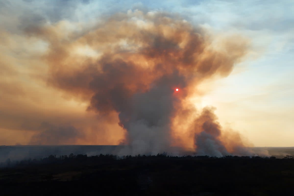 A drone view shows smoke rising from wildfires in Brasilia National Park on Sunday. The dry season is not close to being over in Brazil (REUTERS/Ueslei Marcelino)