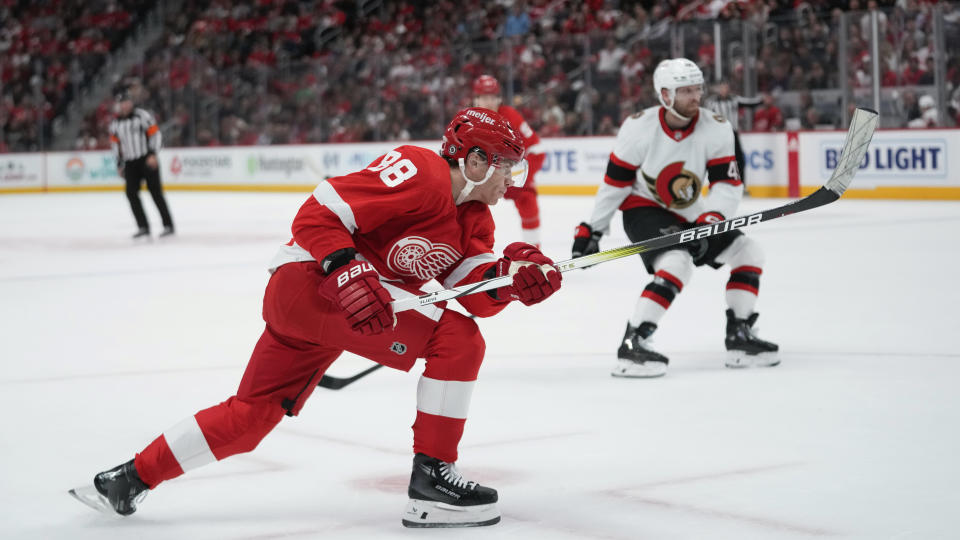 Detroit Red Wings right wing Patrick Kane (88) follows through on his shot that scored against the Ottawa Senators in the first period of an NHL hockey game Saturday, Dec. 9, 2023, in Detroit. (AP Photo/Paul Sancya)