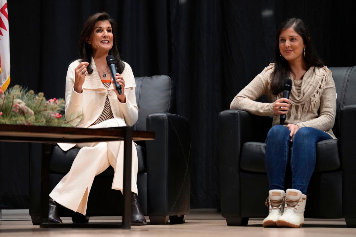 Republican presidential candidate former U.N. Ambassador Nikki Haley, center, speaks as her daughter Rena, right, looks on during U.S. Rep. Randy Feenstra's, R-Iowa, Faith and Family with the Feenstras event, Saturday, Dec. 9, 2023, in Sioux Center, Iowa.