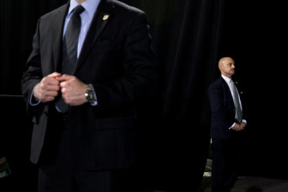Secret Service Agents stand in position as President Barack Obama speaks about the economy and the middle class to the City Club of Cleveland, at the Global Center for Health Innovation, Wednesday, March 18, 2015, in Cleveland. (AP Photo/Jacquelyn Martin)