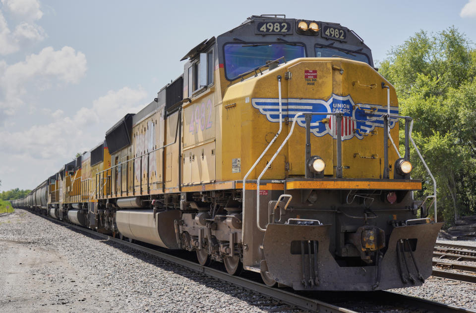 FILE - A Union Pacific train travels through Union, Neb., July 31, 2018. Federal inspectors found an alarming number of defects in the locomotives and railcars Union Pacific was using at the world's largest rail yard in North Platte, Neb., this summer and the railroad was reluctant to fix the problems. Federal Railroad Administrator Amit Bose wrote a letter to UP's top three executives Friday, Sept. 8, 2023, expressing his concern that the defects represent a “significant risk to rail safety on the Union Pacific' railroad.” (AP Photo/Nati Harnik, File)