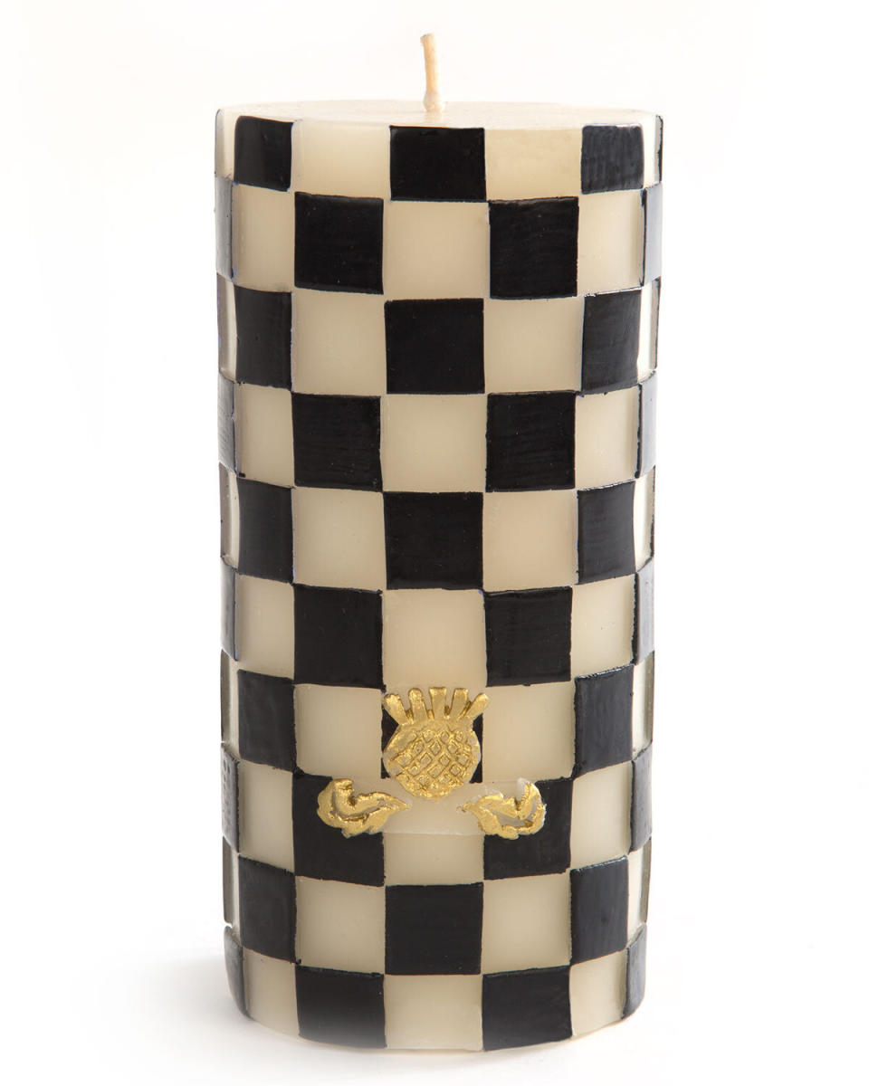 This checkered candle was hand-painted. It'll make them feel like the queen (or king) that they are. <a href="https://fave.co/3qnkYdz" target="_blank" rel="noopener noreferrer">Find it for $32 at Neiman Marcus</a>.