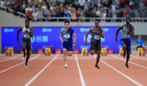 Athletics - Diamond League - Shanghai - Shanghai Stadium, Shanghai, China - May 18, 2019 Noah Lyles of the U.S. on his way to winning the Men's 100m REUTERS/Aly Song