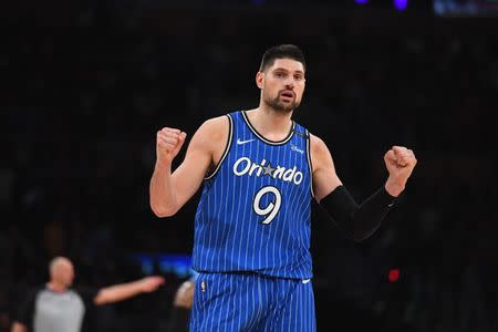 Nov 25, 2018; Los Angeles, CA, USA; Orlando Magic center Nikola Vucevic (9) celebrate the Magic's 108-104 win over the Los Angeles Lakers at Staples Center. Mandatory Credit: Robert Hanashiro-USA TODAY Sports