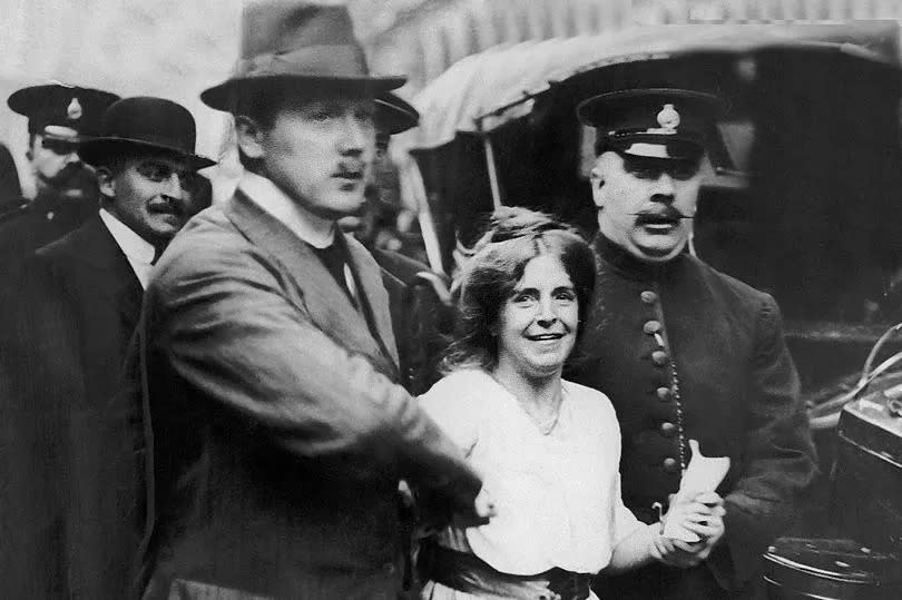 Women's rights campaigner, Annie Kenney, being arrested