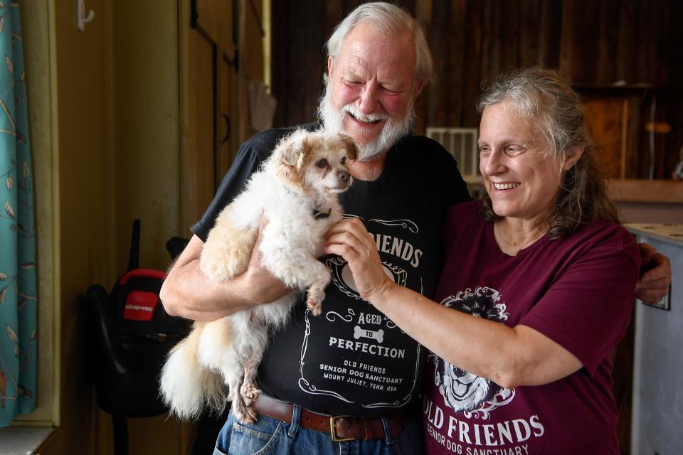 Michael and Zina Goodin, the founders of Old Friends Senior Dog Sanctuary in Mount Juliet, pose with Tigger, Tenn., Monday, Sept. 24, 2018.