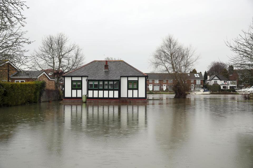 A house sits in flood water in Laleham Reach, Surrey, after the banks of the River Thames burst. Picture date: Wednesday February 3, 2021. (Photo by Steve Parsons/PA Images via Getty Images)