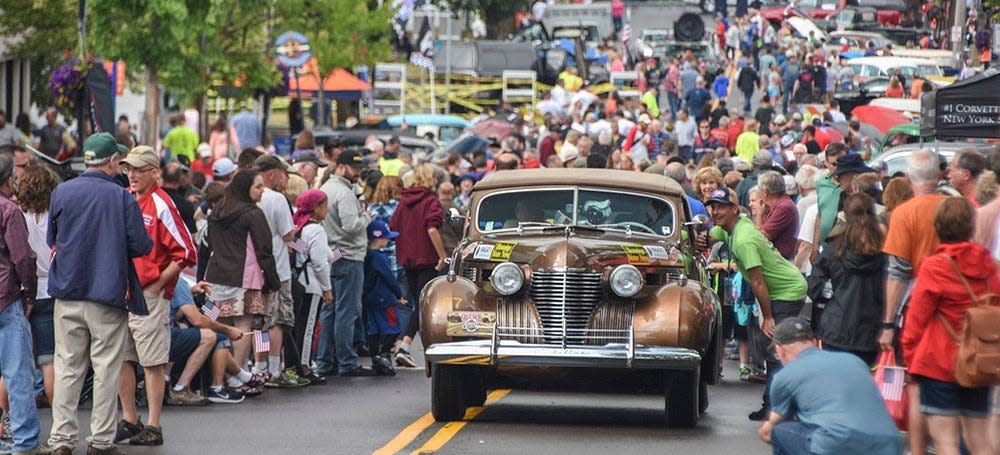 Onlookers greet one of the participants in The Great Race, which will stop June 22 at the Studebaker National Museum and The History Museum in South Bend.