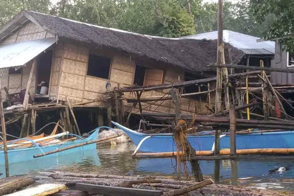 This handout photo released by the Local Government Unit of Hinatuan shows a damaged house after an earthquake struck Hinatuan town, Surigao del Sur province, southern Philippines on Sunday Dec. 3, 2023. A powerful earthquake struck Saturday off the southern Philippine coast, prompting many villagers to flee their homes in panic around midnight after Philippine authorities issued a tsunami warning. (LGU Hinatuan via AP)