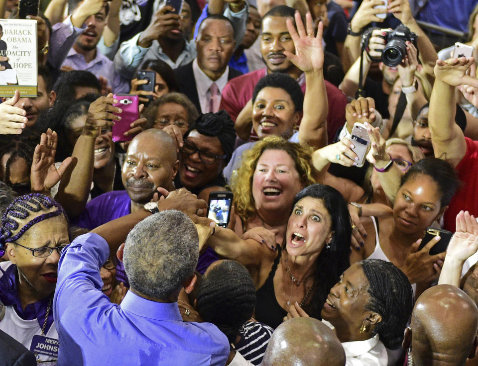 FILE - In this Sept. 13, 2018, file photo, former President Barack Obama shakes hands with members of the audience as he campaigns in support of Ohio gubernatorial candidate Richard Cordray in Cleveland. (AP Photo/David Dermer, File)