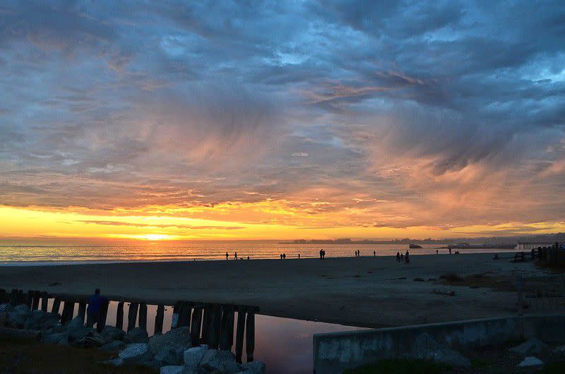 Virga, or streak of rain that evaporates before reaching the ground, is shown at sunset in Rio Del Mar Beach in Aptos, California. Valerie Lemke submitted the photo to the Weather in Focus Photo Contest. 