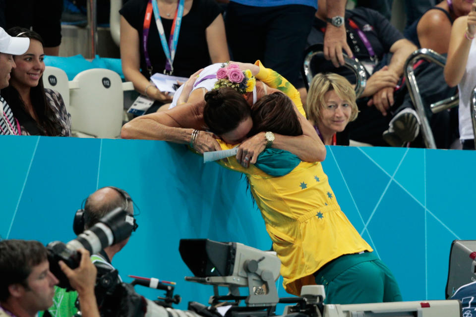 Emily Seebohm of Australia celebrates with her mom in the stands after she Seebohm received her silver medal during the medal ceremony for the Women's 100m Backstroke on Day 3 of the London 2012 Olympic Games at the Aquatics Centre on July 30, 2012 in London, England. (Photo by Adam Pretty/Getty Images)