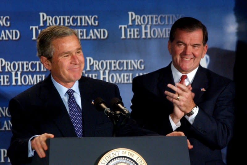 President George W. Bush shares a laugh with Homeland Security Director Tom Ridge on November 12, 2002, one week before Congress voted to create the Cabinet-level Department of Homeland Security. Ridge became the first secretary of the department. File Photo by Michael Kleinfeld/UPI