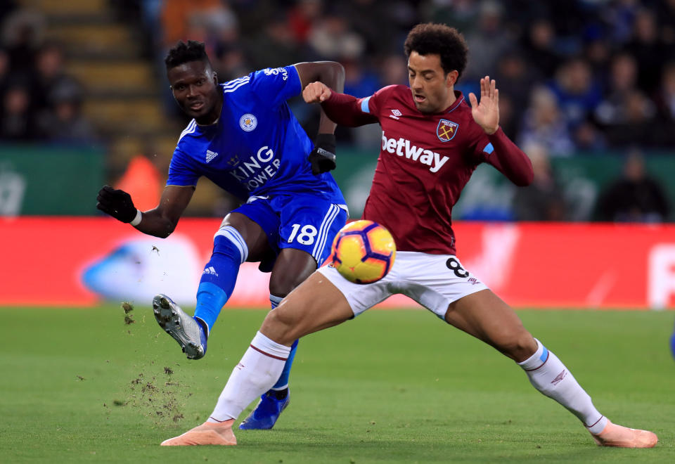 Leicester City’s Daniel Amartey (left) tangles with West Ham’s Felipe Anderson