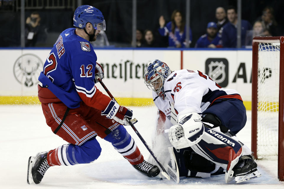 Washington Capitals goaltender Darcy Kuemper makes a save against New York Rangers right wing Julien Gauthier (12) during the second period of an NHL hockey game Tuesday, Dec. 27, 2022, in New York. (AP Photo/Adam Hunger)