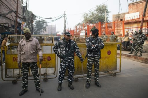 Riot police and paramilitary troops erected steel barricades on roads leading to the mosque in old Delhi