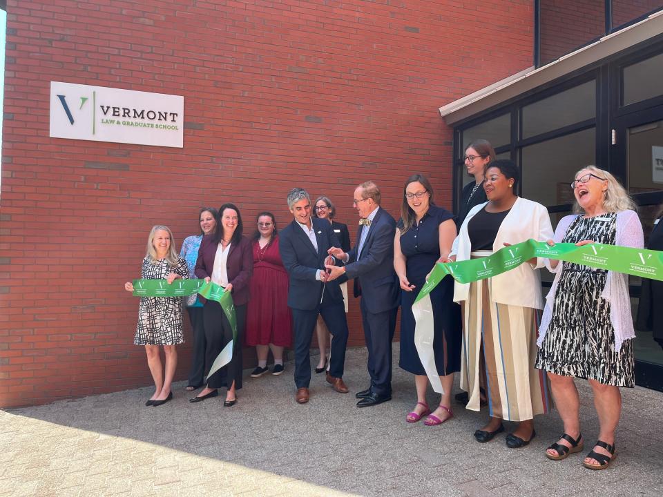 Mayor Miro Weinberger and Rod Smolla, president of Vermont Law and Graduate School, cut the ribbon to officially open the school's downtown location. The office will be the home of the school's new Center for Justice Reform Clinic, which will offer legal aid to people in the criminal justice system and immigrants.